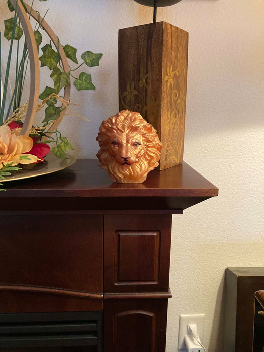 Decorative lion’s head sculpture, perfect for creating a bold focal point in your home or office